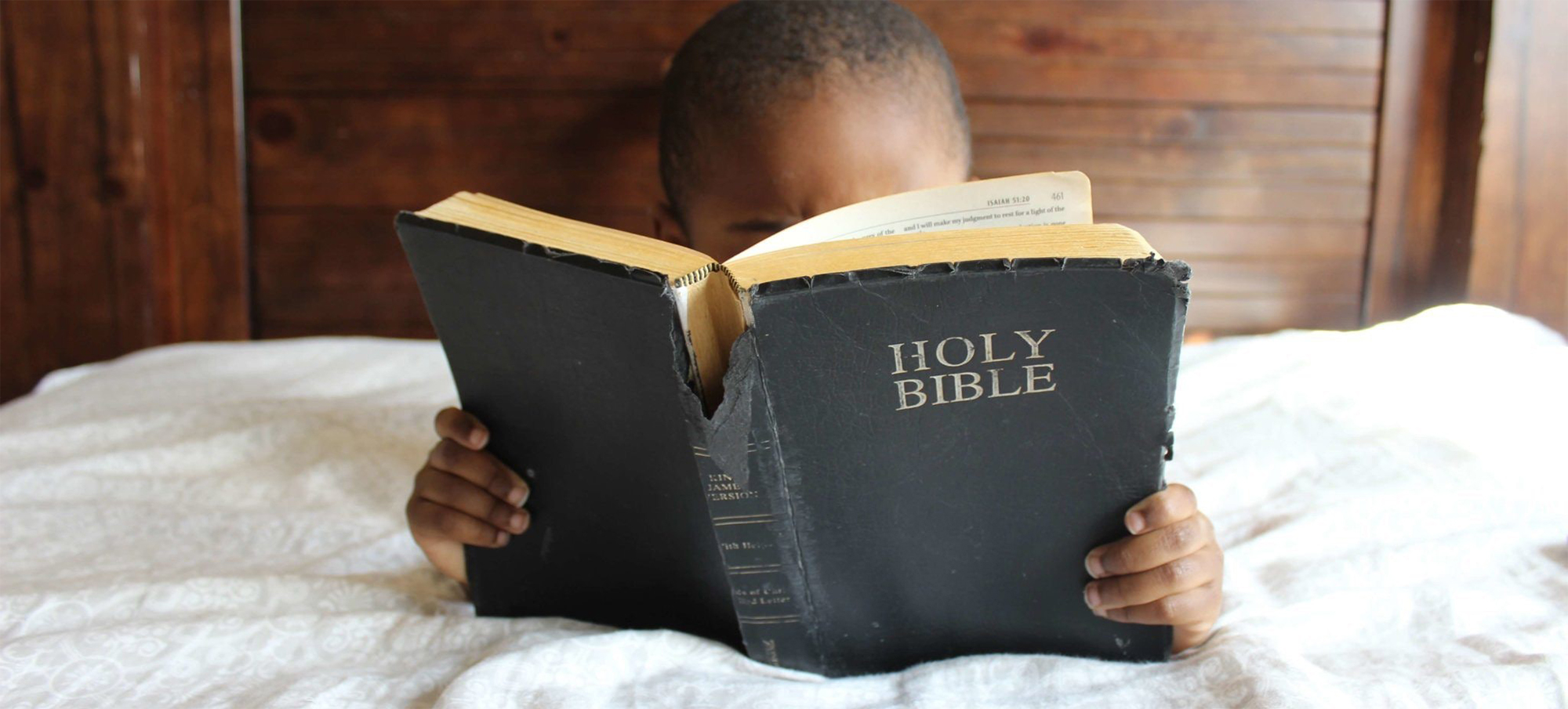 boy reading bible