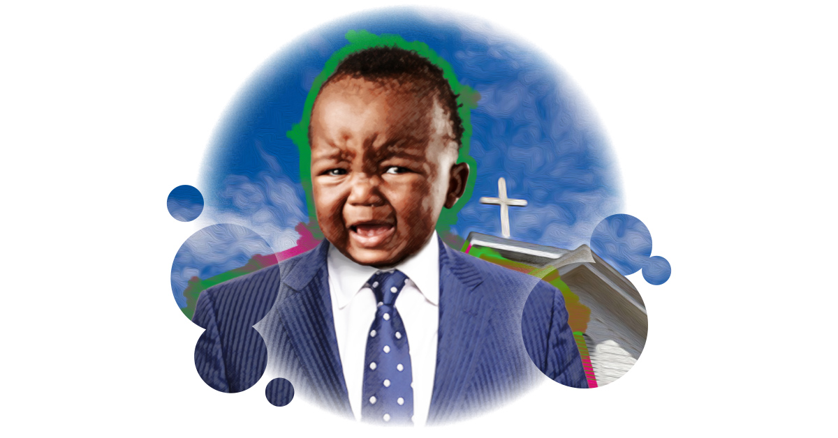 an unhappy baby in a suit