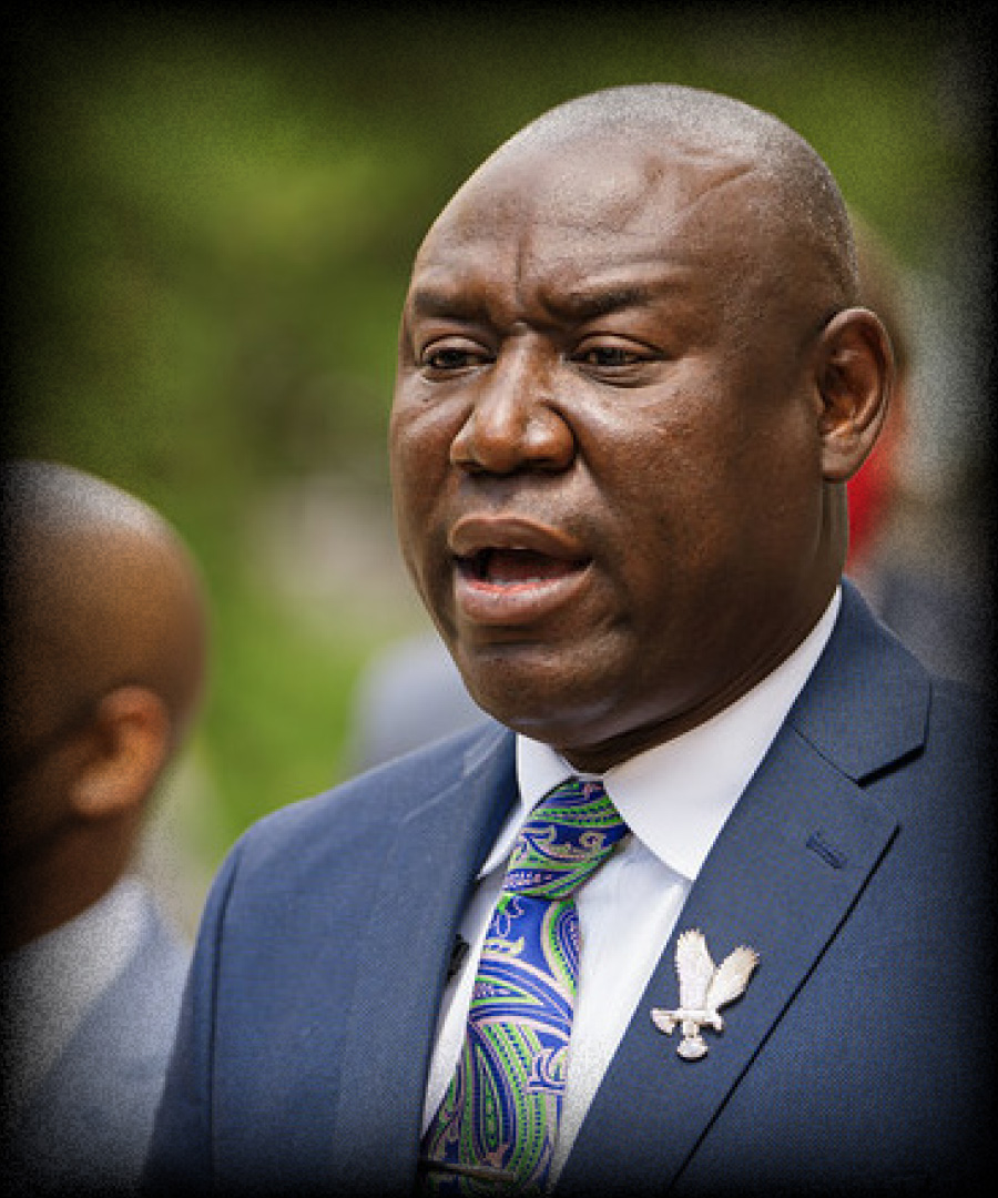 Ben Crump in a suit publicly speaking