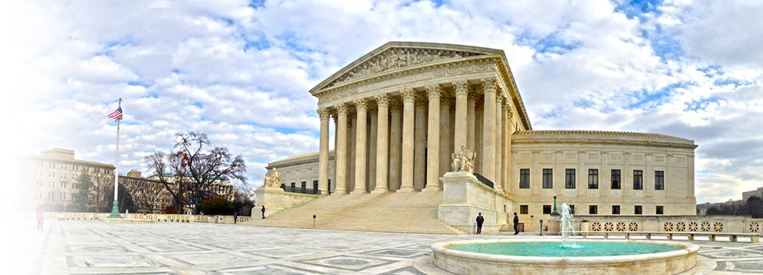 a large court house with a pillared front