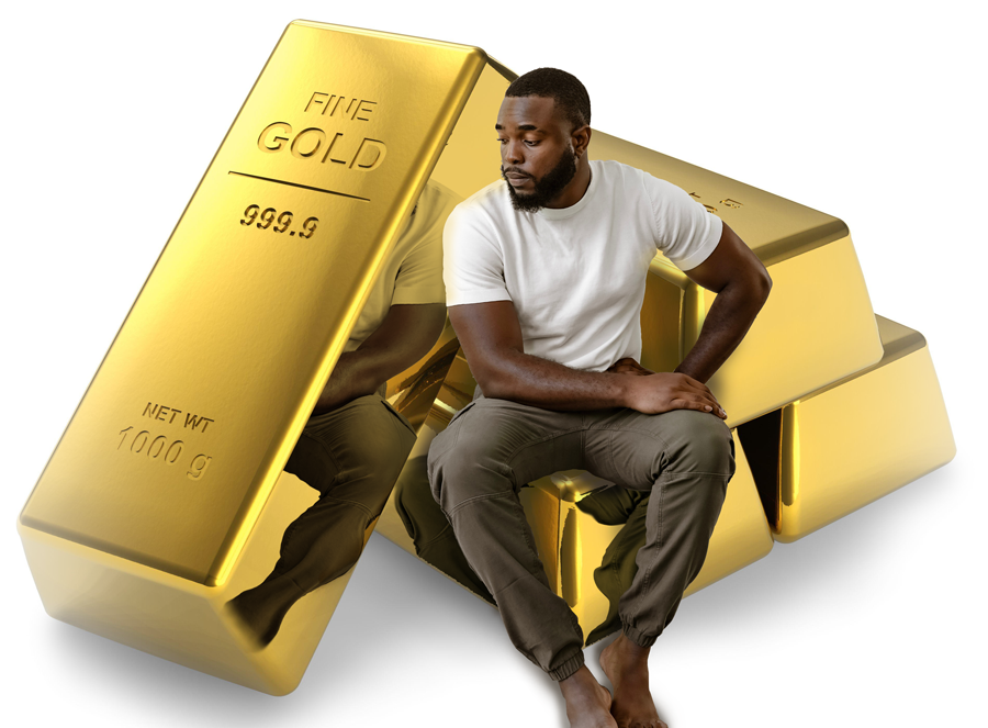 man sitting on stack of gold bars