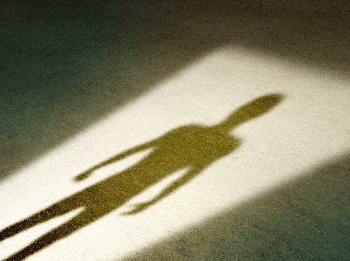 shadow of body figure in doorway