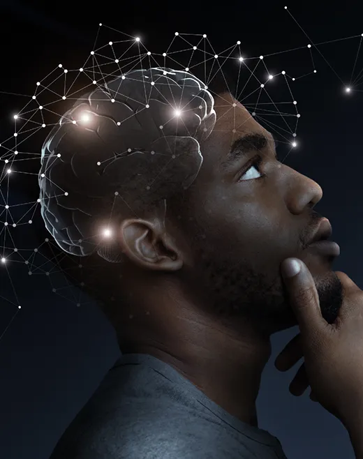 man with hand on chin in seemingly deep thought with brain illustration on his head