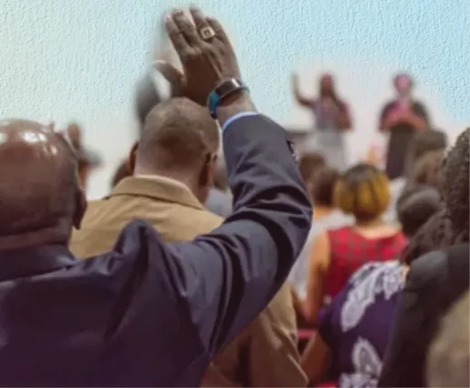 Photo of a person raising their hand...