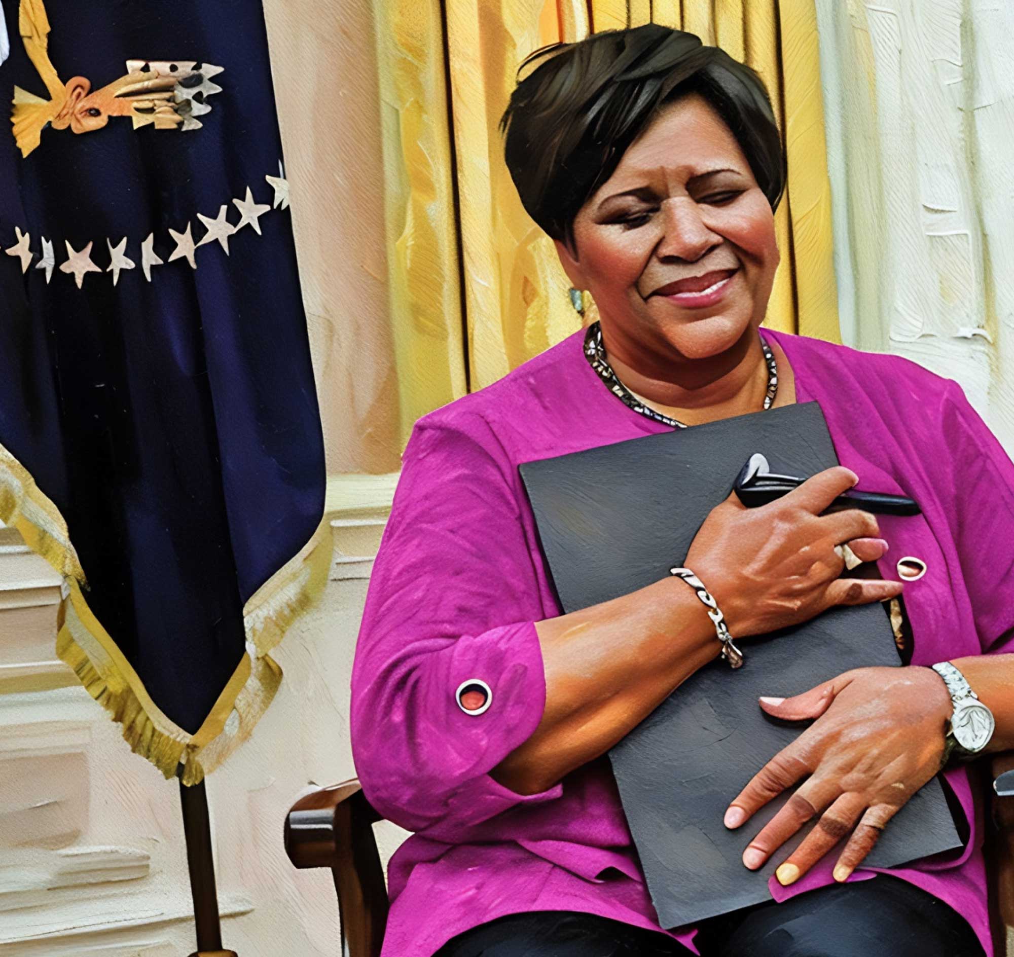 Alice Johnson smiling with eyes closed while holding a black folder to her chest