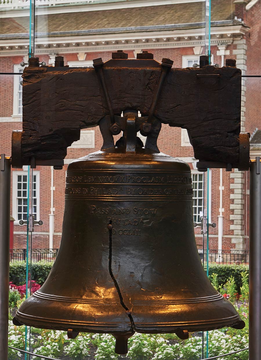 The historic Liberty Bell displayed in front of Independence Hall in Philadelphia.