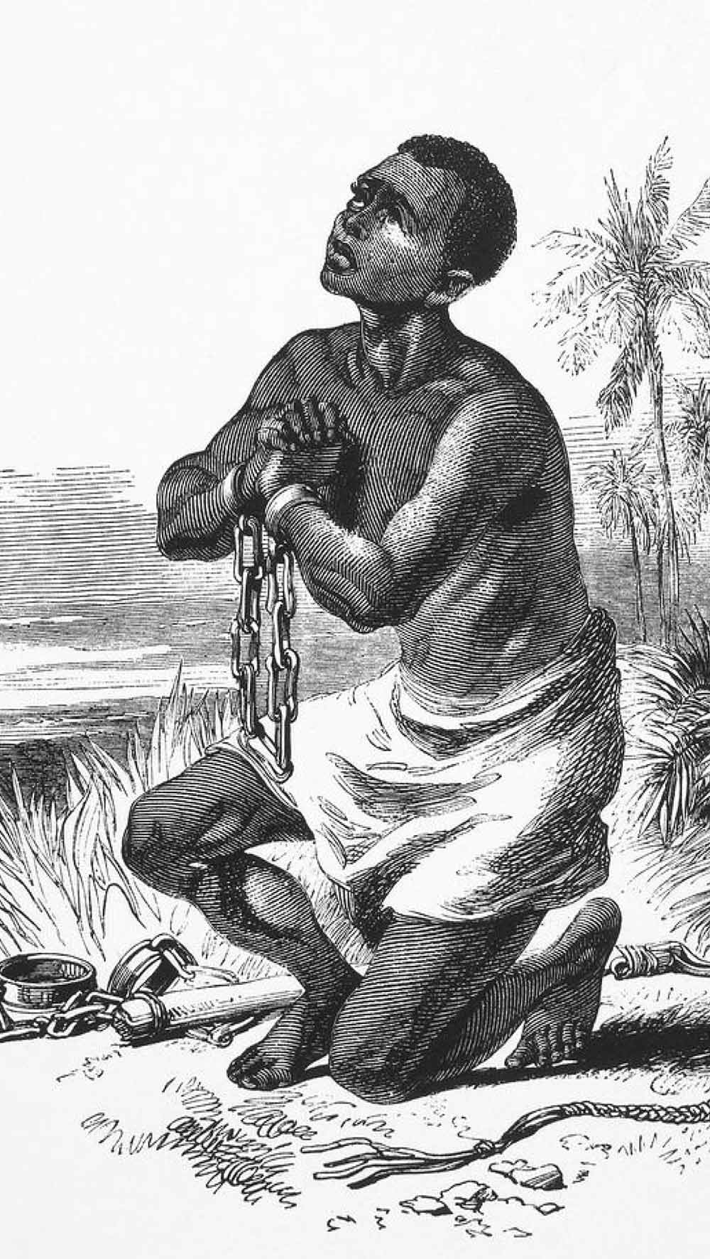 An abolitionist woodcut illustration of an enslaved Black man kneeling on a shore in chains, holding his hands up in a gesture of prayer.